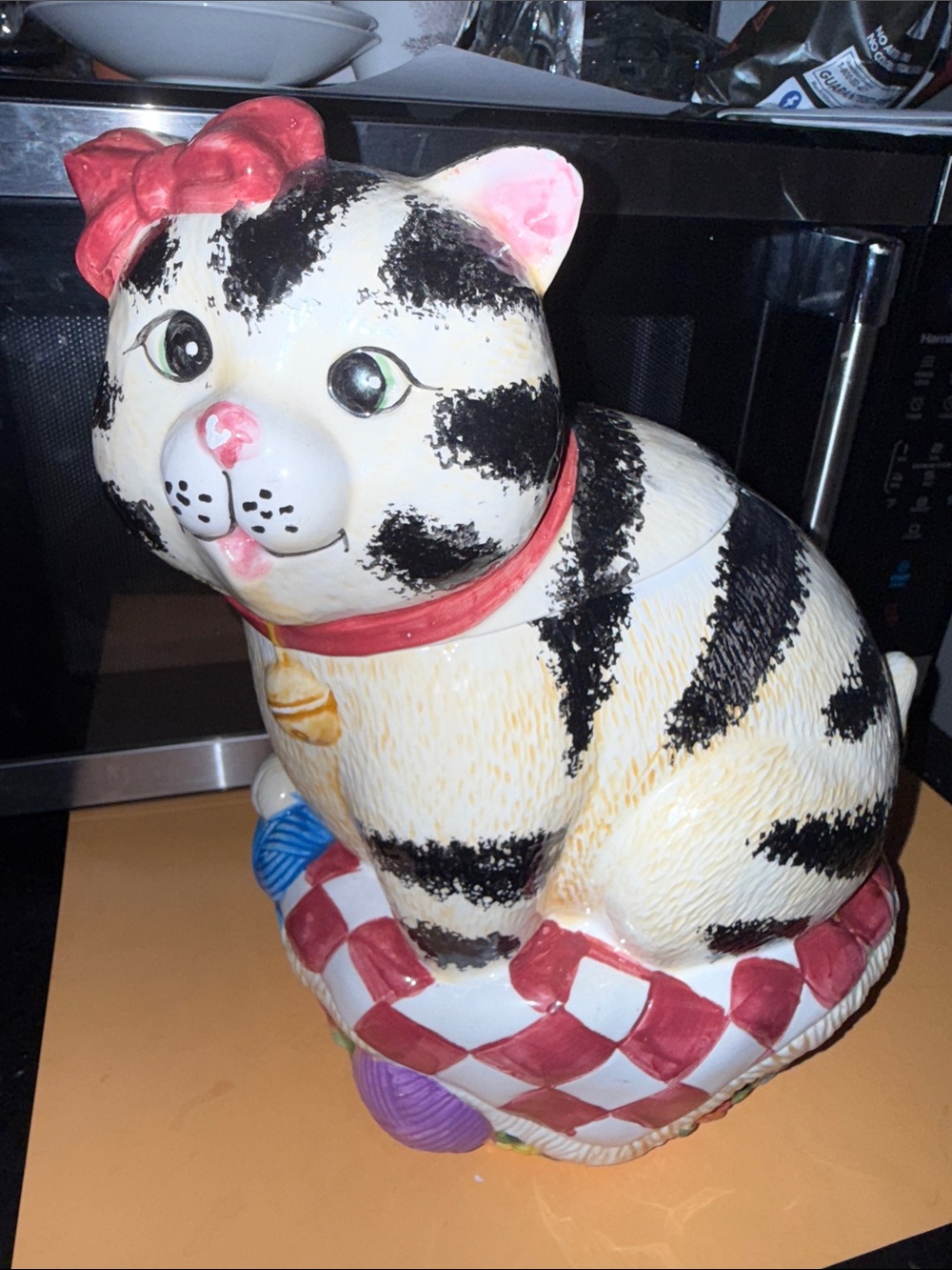 Ceramic Black & White Striped Cat Figurine with Red Bow